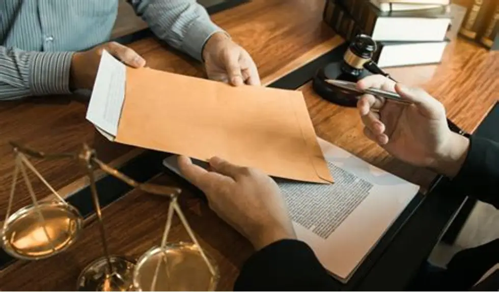 Courier delivering envelopes between law firms in the CBD